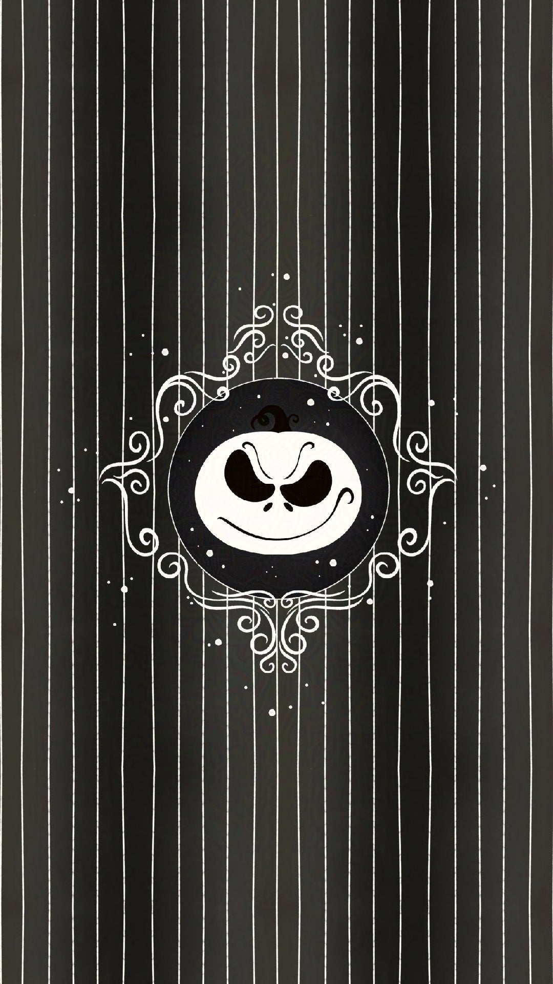 jack skellington inspired pumpkin face with decorative frame on a black and white striped background
