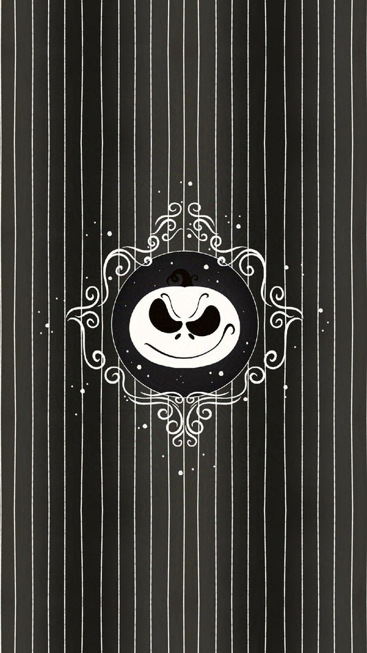 jack skellington inspired pumpkin face with decorative frame on a black and white striped background